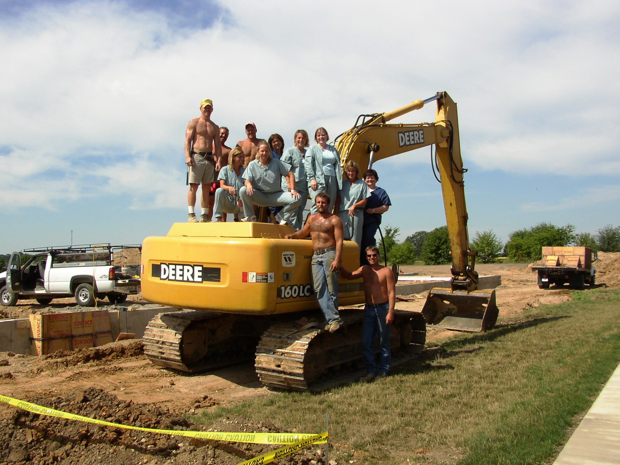 The first ROSC employees pose with the construction crew